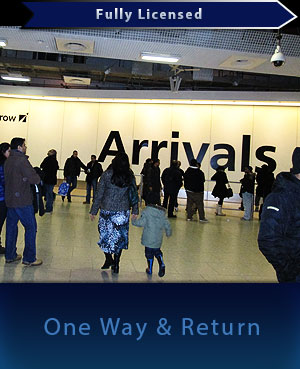 airport arrivals longe showing lots of busy people heading for their airport taxis