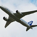 a manchester passenger plane landing with one way or return airport taxis awaiting a customer on board